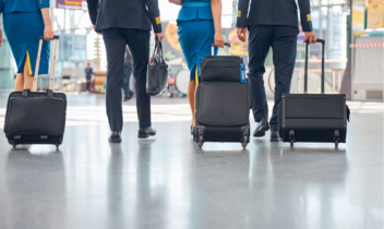 traveling air crew with suitcases