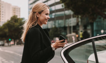 woman taking a taxi 