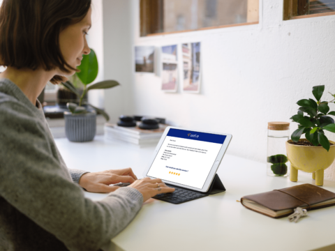 Young woman working on the ipad pro mockup mockuuups studio 1